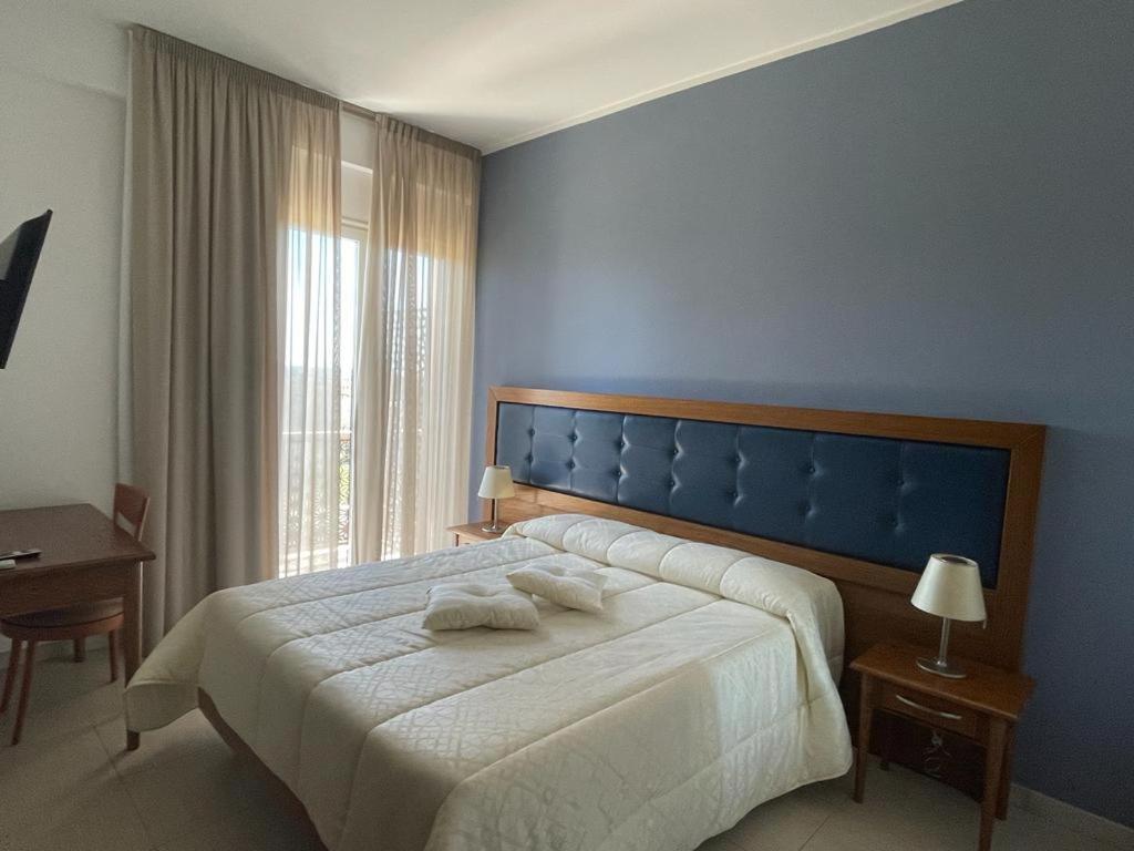 Hotel Posidonia ポルト・チェザーレオ エクステリア 写真