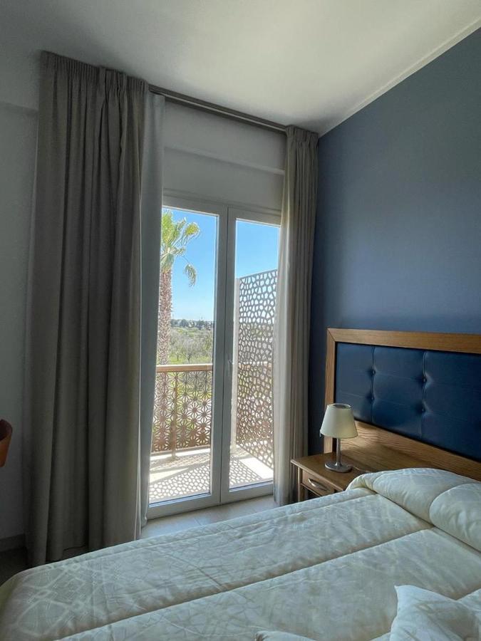 Hotel Posidonia ポルト・チェザーレオ エクステリア 写真